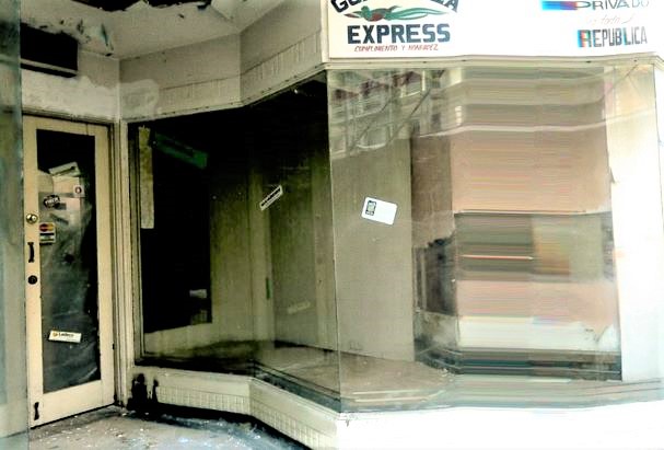 Before: view of unrestored store front